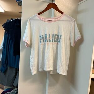 White t shirt from JUICY COUTURE size L with Malibu lettering.